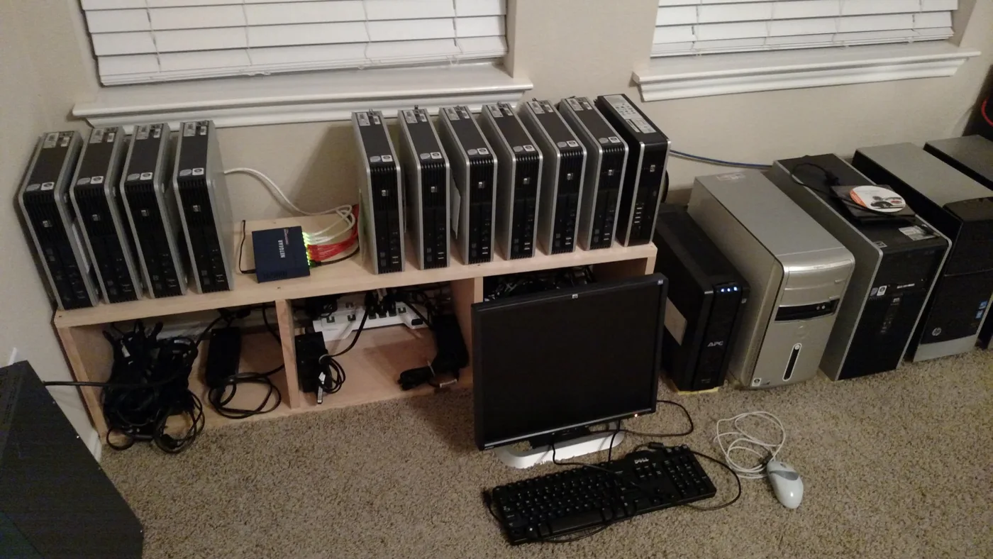 Homelab v1 with small desktop computers and networking equipment