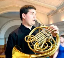 Matthew Brahms playing horn