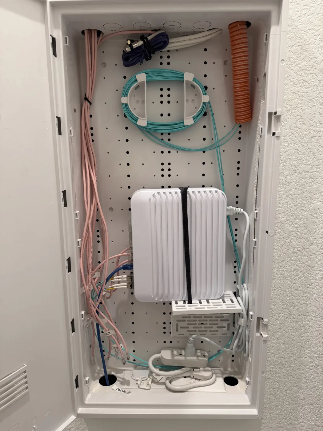 Structured media enclosure with network wiring and fiber